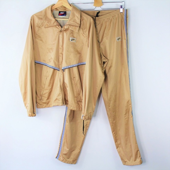 nike tracksuit gold
